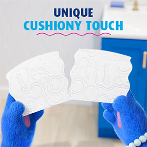 Close-up of Molly bear tearing Ultra Soft Smooth Tear. Image reads "Unique Cushiony Touch".